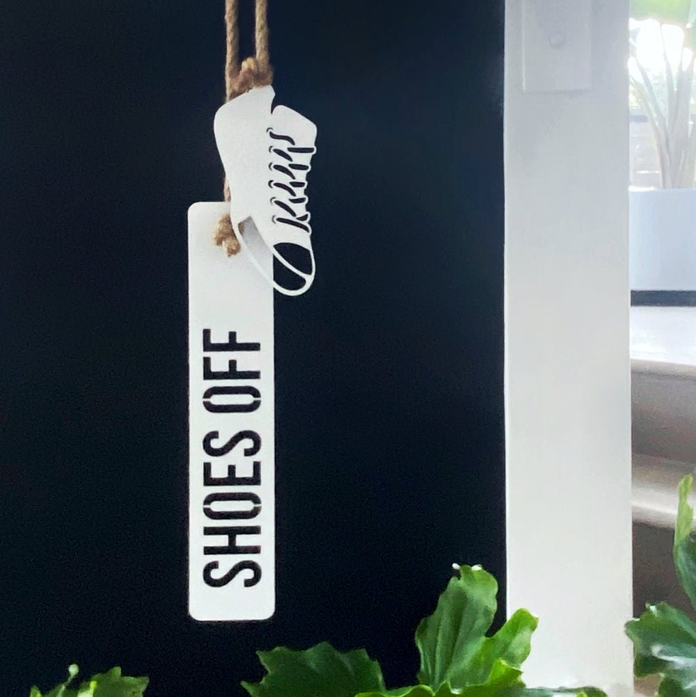 Add this sign to your entryway to ask your guests to take their shoes off so you don't have to.  