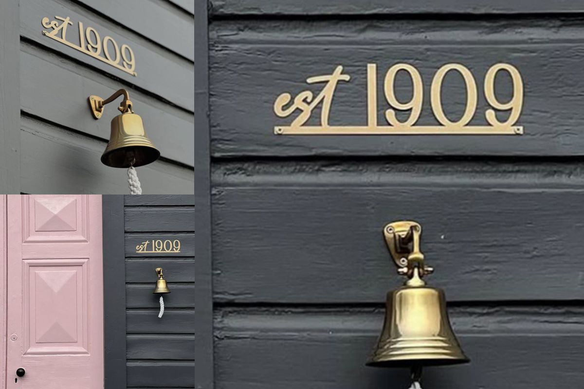 Personalised established house sign gold steel est 1909 on historic courthouse Fairlie New Zealand