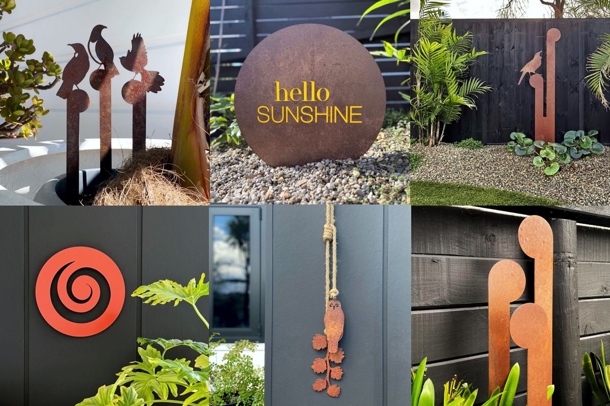 NZ-made steel garden ornaments including metal birds and sculptures by LisaSarah, displayed in a lush New Zealand garden setting