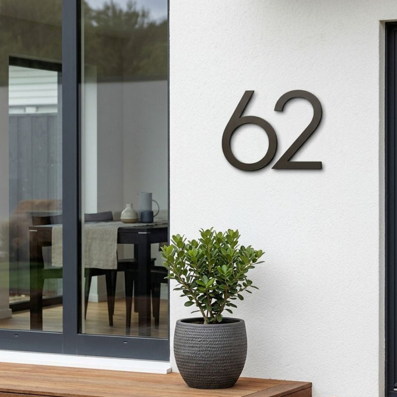 Large 50cm black steel custom house number on a modern Auckland New Zealand home