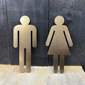 Close up view of LisaSarah's bathroom signage in pewter. 