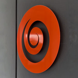Metal koru Wall Art by LisaSarah, brightening a New Zealand entryway with vibrant orange hues.