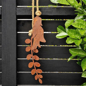 Close up view of corten steel kowhai fence art in Auckland backyard