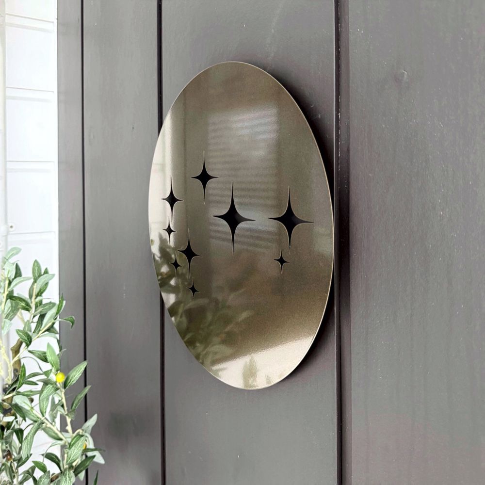 Matariki art piece by Lisa Sarah: 40cm stainless steel with glossy bronze finish, inspired by the Matariki star cluster