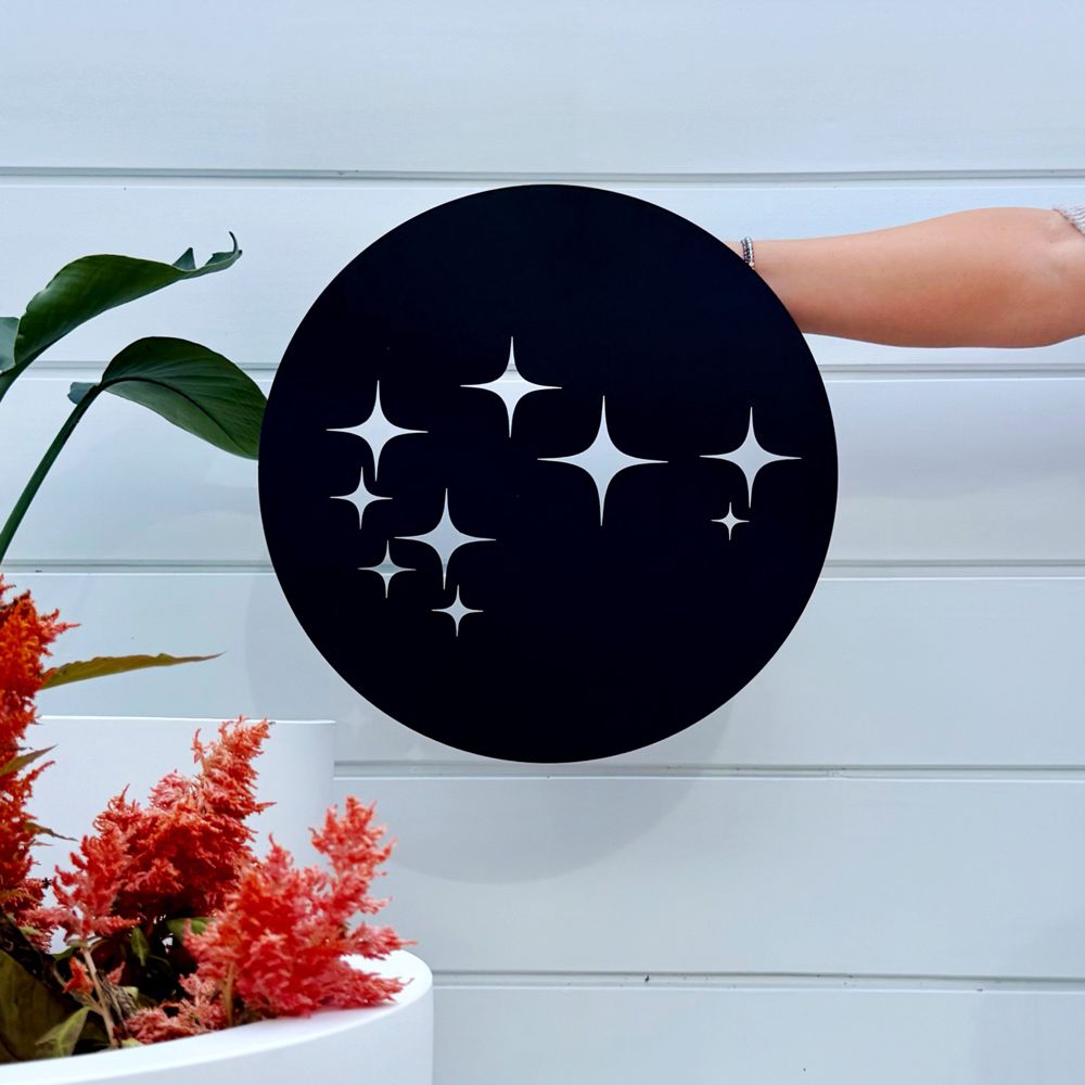 Round Wall Art NZ in outdoor patio space or garden in New Zealand home