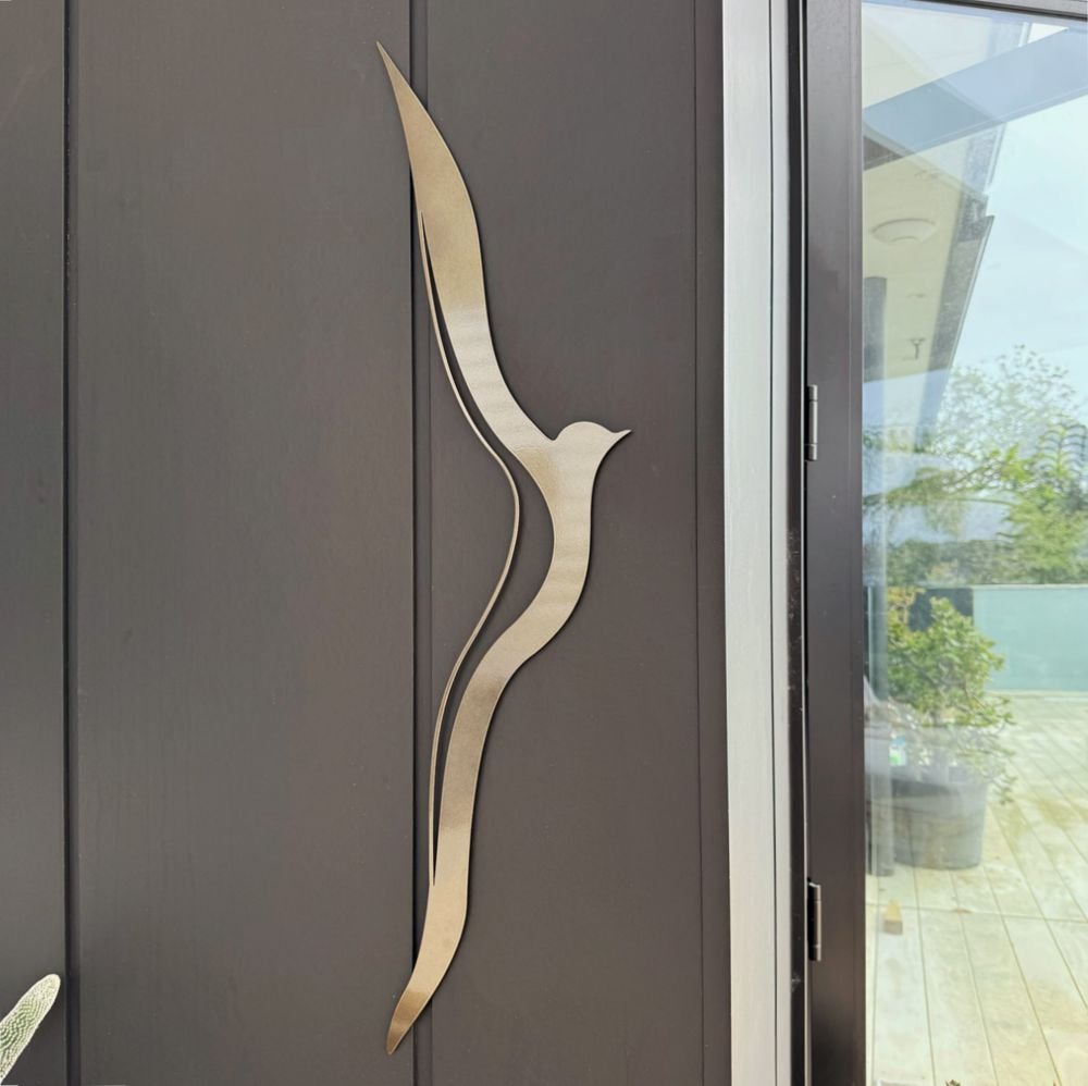 NZ-made steel outdoor wall art - albatross weatherproof metal decor for all homes styles. 