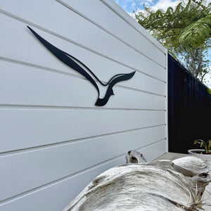 Side view of albatross in flight wall art for exterior on modern outdoor wall in New Zealand. 