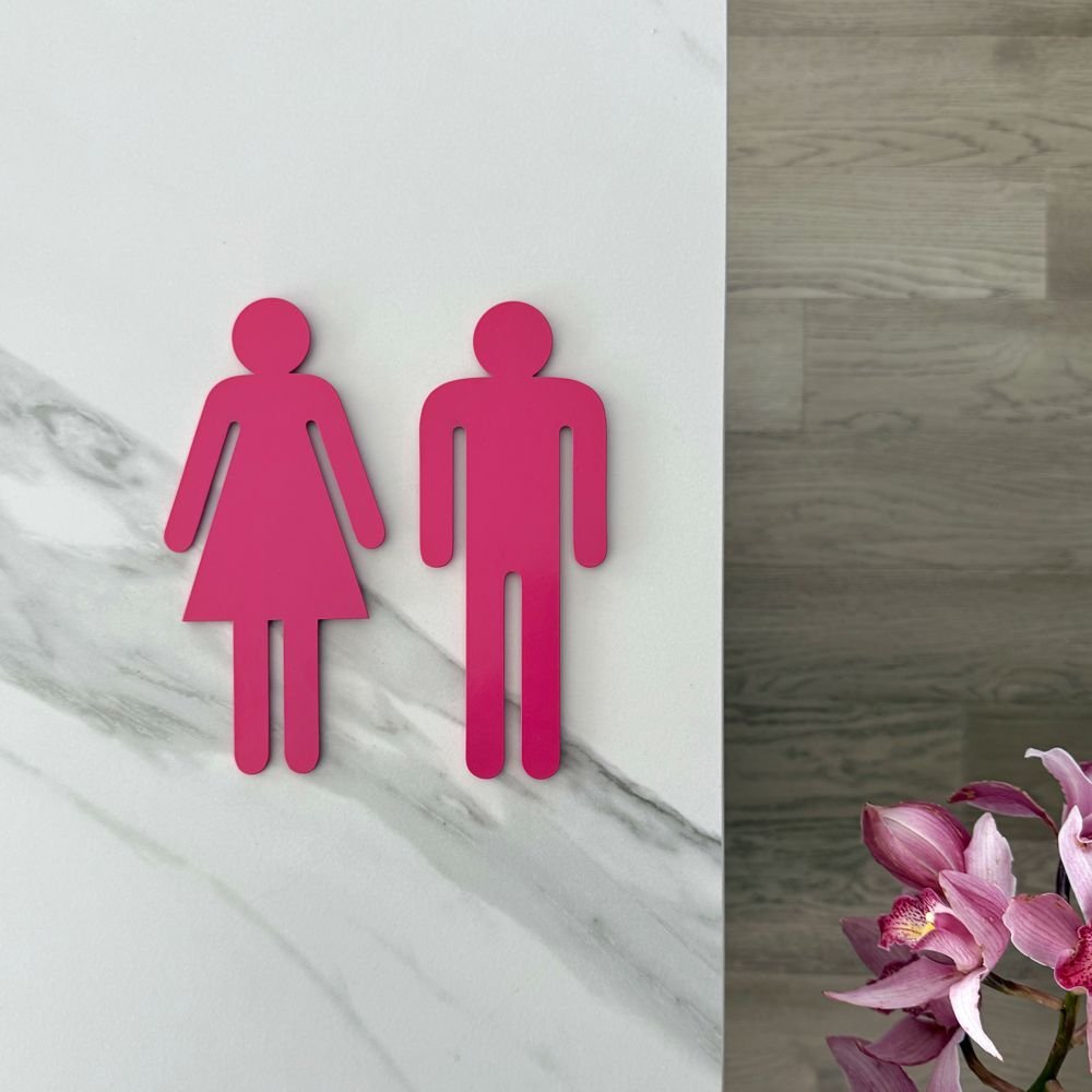 Hot pink steel bathroom symbols – handcrafted metal wall art NZ for modern bathrooms