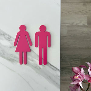 Hot pink steel bathroom symbols – handcrafted metal wall art NZ for modern bathrooms