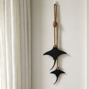 Two matt black steel stingrays on rope, 105cm wall hanging, New Zealand made