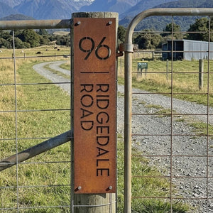 Custom corten steel address sign installed on a rural farm in New Zealand home