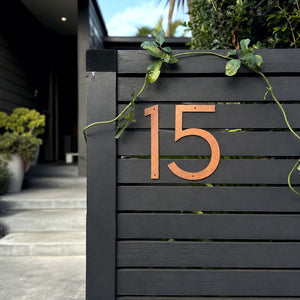 Corten steel custom house number 15 on a modern fence at an auckland home