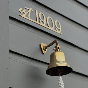 Personalised home established plaque gold steel outdoor sign on classic NZ house