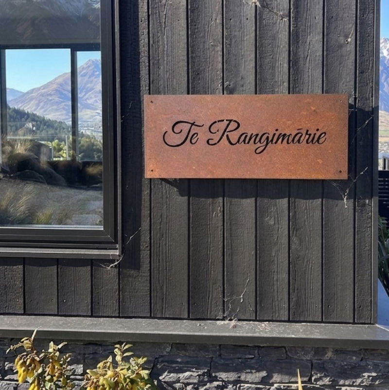 Custom corten steel sign on lifestyle block in Queenstown, New Zealand