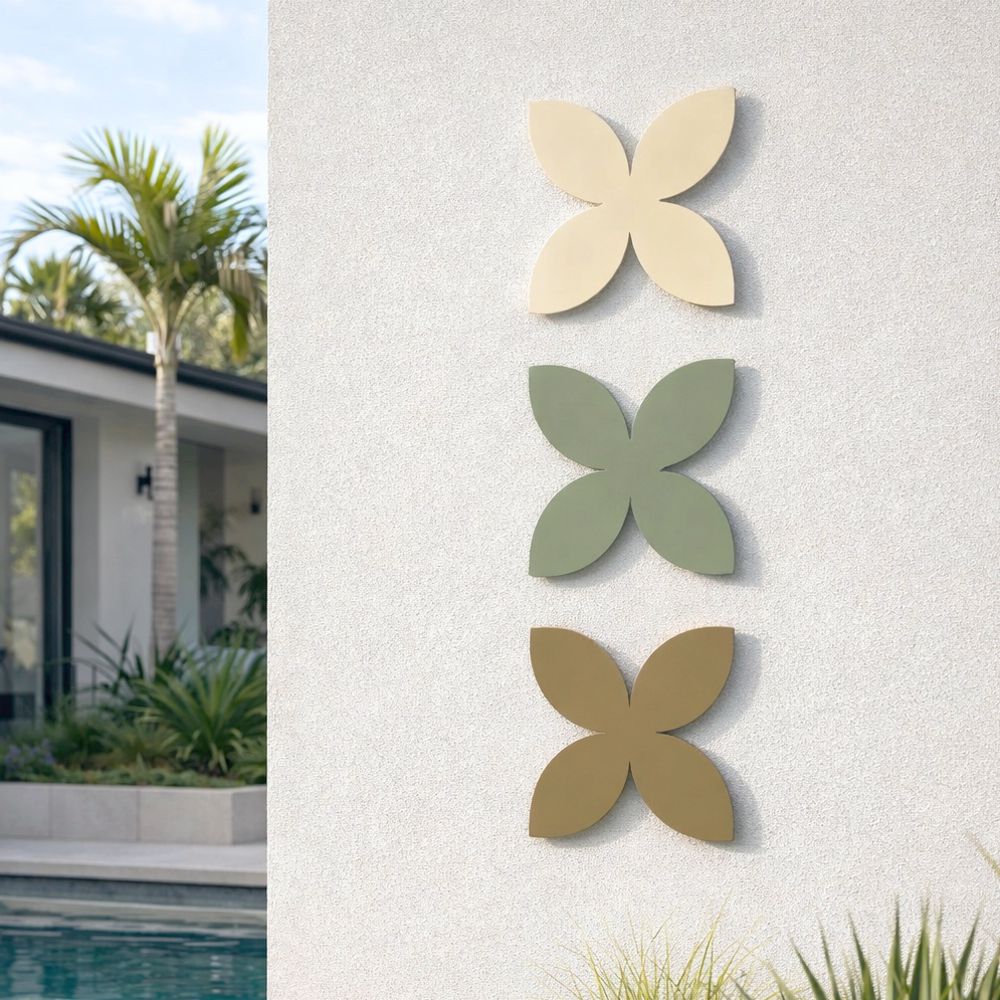 Modern frangipani wall art in NZ home, steel wall art for living room, minimalist coastal style wall decor New Zealand
