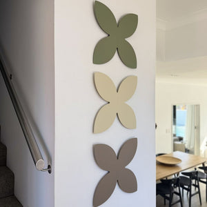 Frangipani metal wall art in modern coastal home, NZ made steel wall decor for living room or outdoor space