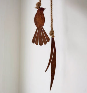 Close up of fantail hanging garden ornament of corten steel