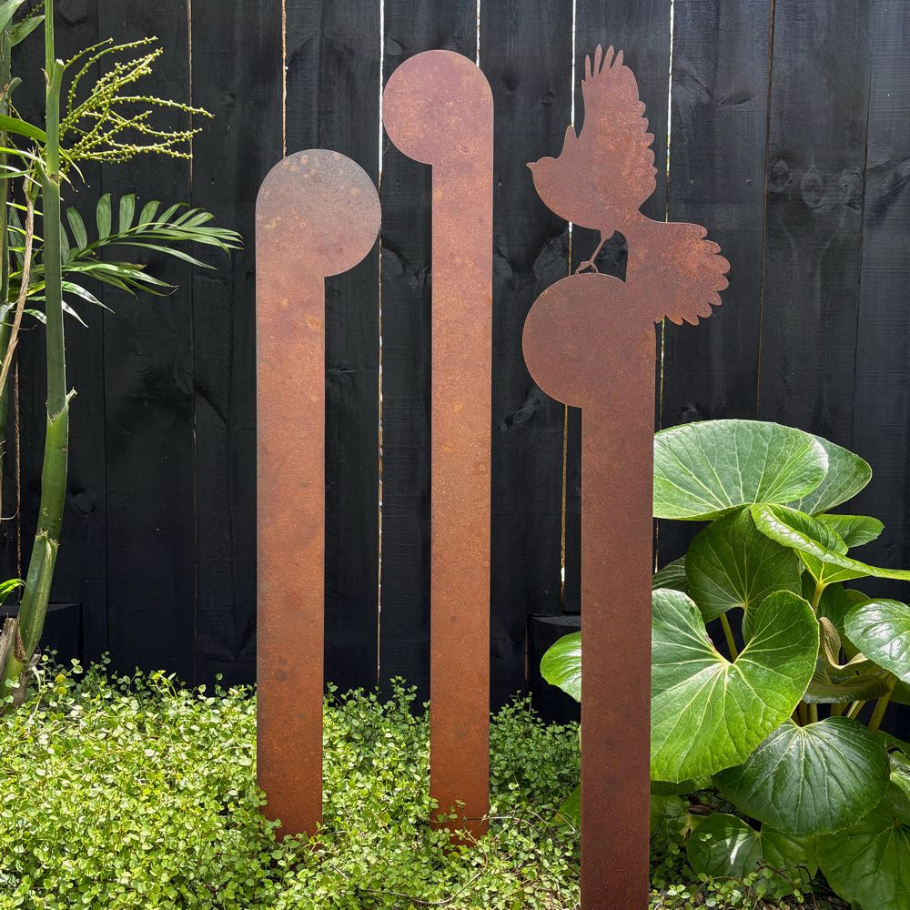 Steel Art NZ - corten garden sculpture, koru and fantail in native NZ garden