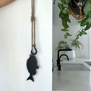 Fish and hook wall hanging in matt black steel on jute rope, gift size, NZ made by LisaSarah