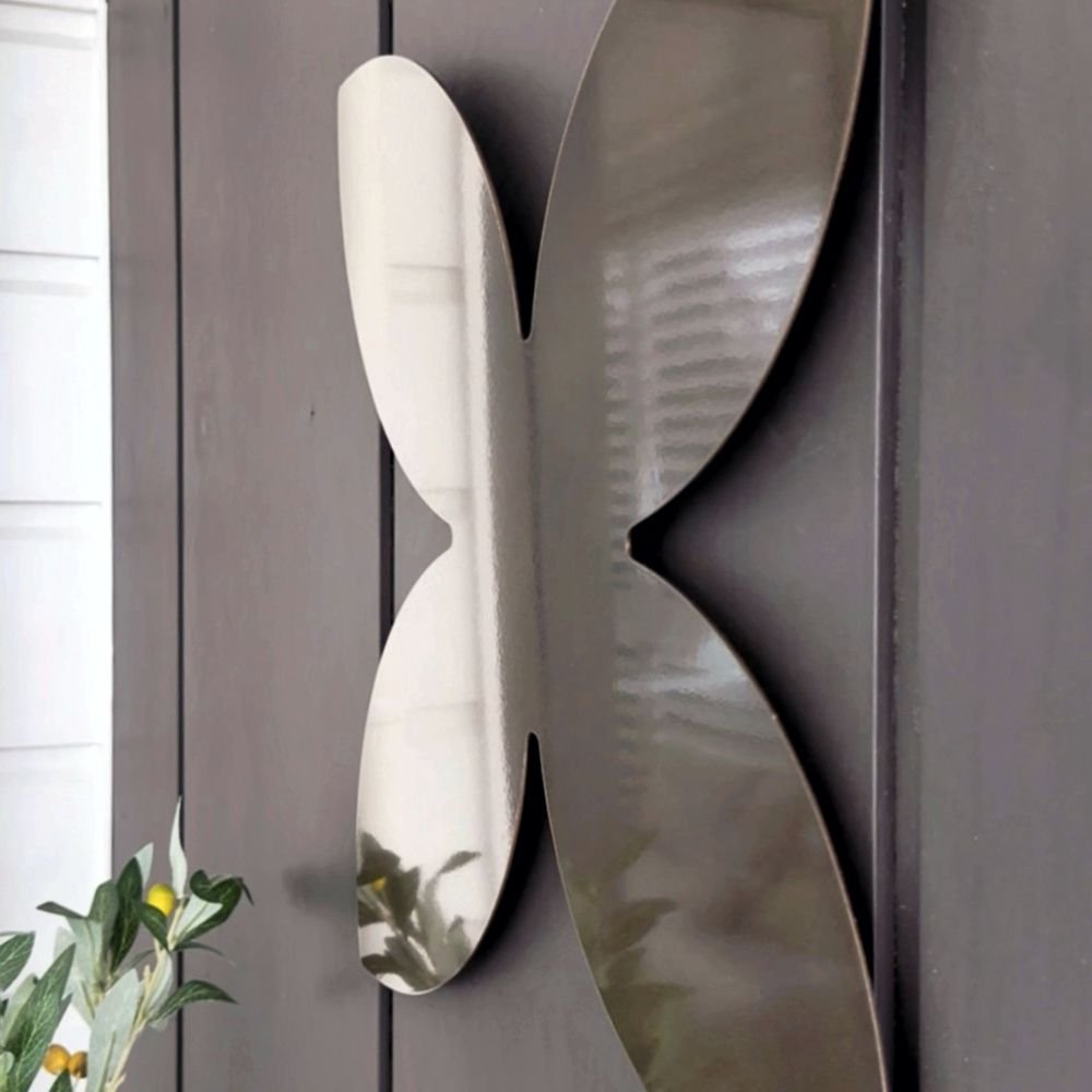 Decorative metallic wall art in outdoor space in New Zealand.  Outdoor Wall Art by LisaSarah