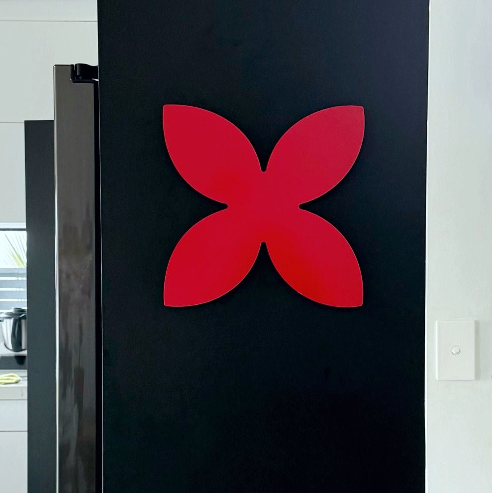 Red frangipani stainless steel wall sculpture for indoor and outdoor NZ and Australian homes