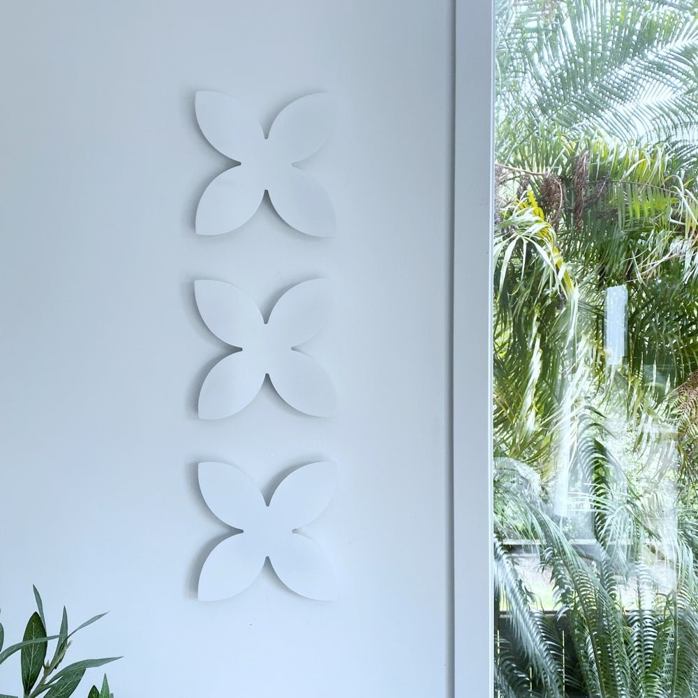 White Steel frangipani wall decor by LisaSarah Steel Designs. 