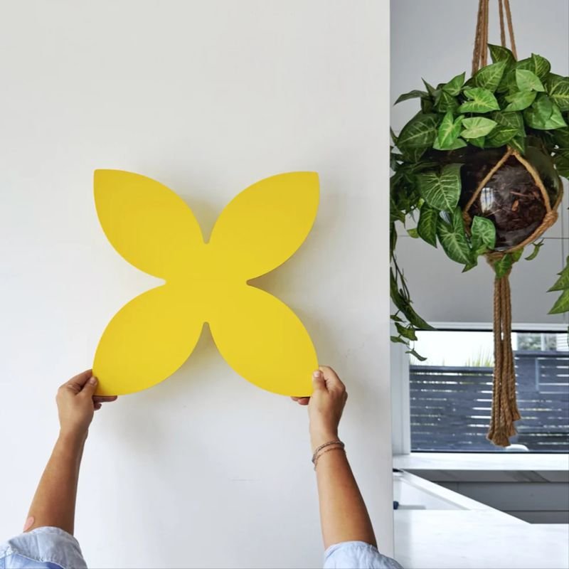 Yellow frangipani outdoor wall art - NZ made steel garden decor. 
