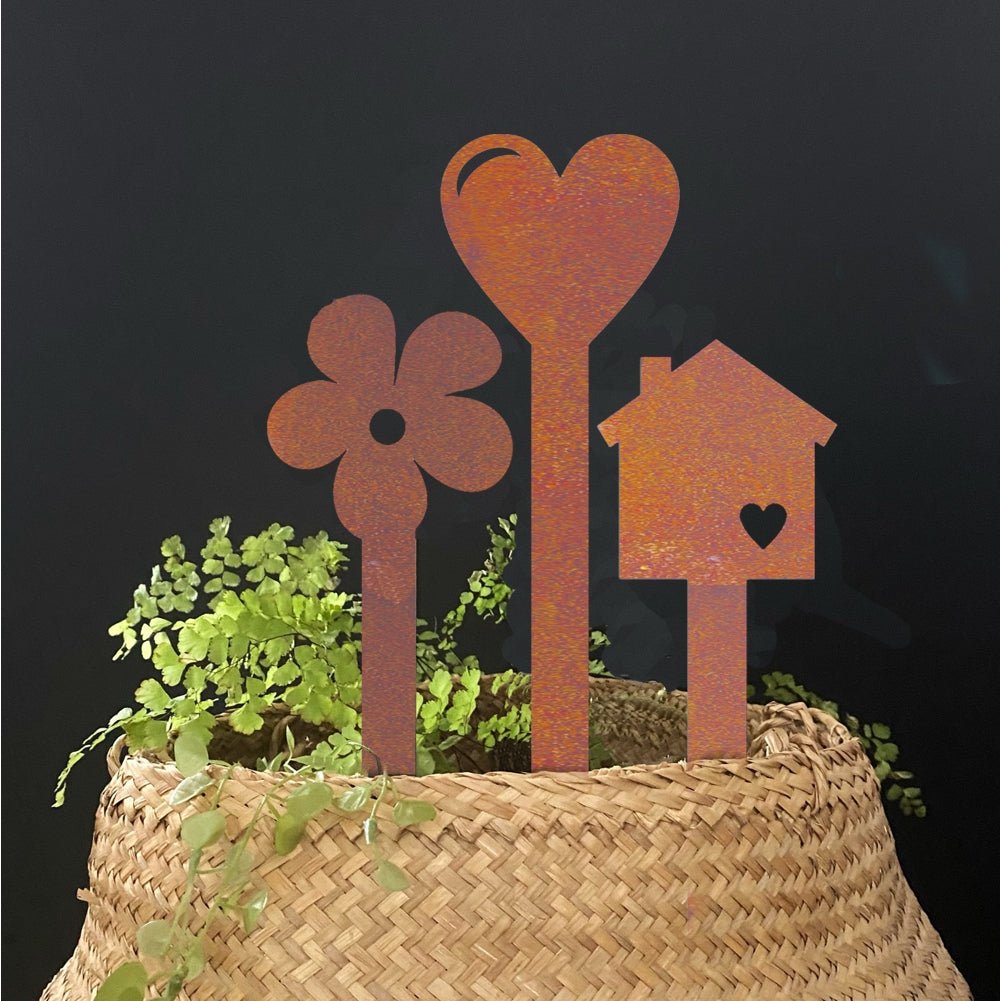 Plant decor NZ made corten steel daisy, heart and tiny house by LisaSarah Steel Designs