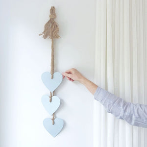 Pale ice blue hearts decor on wall in NZ.  LisaSarah Steel Designs