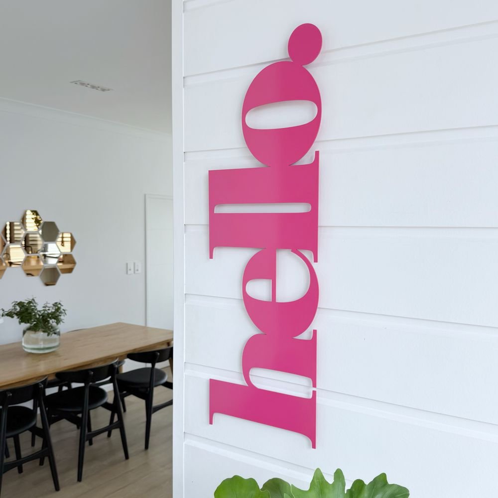 Large hot pink "hello" steel sign by LisaSarah – bold wall art in NZ home interior
