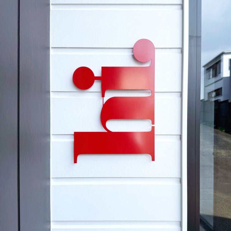 Red wall art on outdoor wall New Zealand