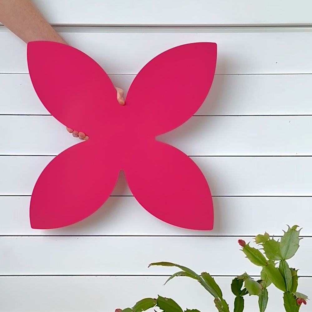 Hot pink frangipani metal wall art NZ – handcrafted steel sculpture for outdoor and indoor spaces