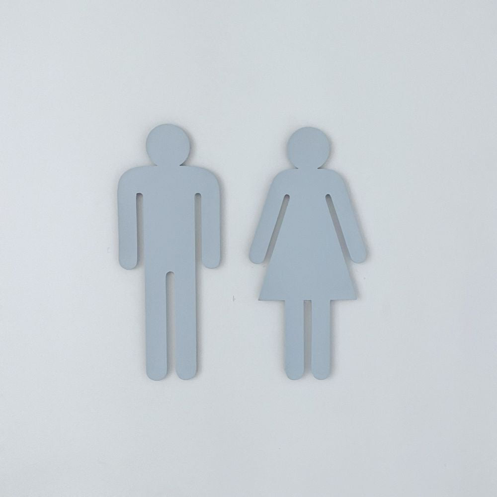 Pale blue bathroom symbols for powder room in New Zealand home. 