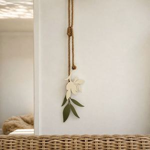 Magnolia and sage green steel flower wall hanging on rope, 80cm drop, New Zealand made