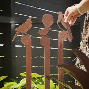 Set of three corten steel native NZ bird sculptures – tui, fantail and kererū garden art. NZ-made rusted steel bird decor for stylish New Zealand gardens