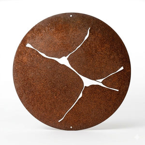 Rust-colored metal wall art with abstract design on a white background