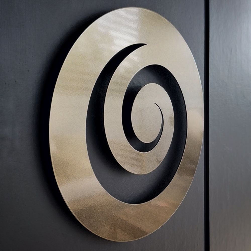 Modern metal koru wall art by LisaSarah, brightening a stylish New Zealand backyard space. 