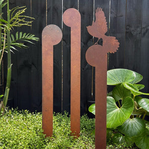 Steel Art NZ - corten garden sculpture, koru and fantail in native NZ garden