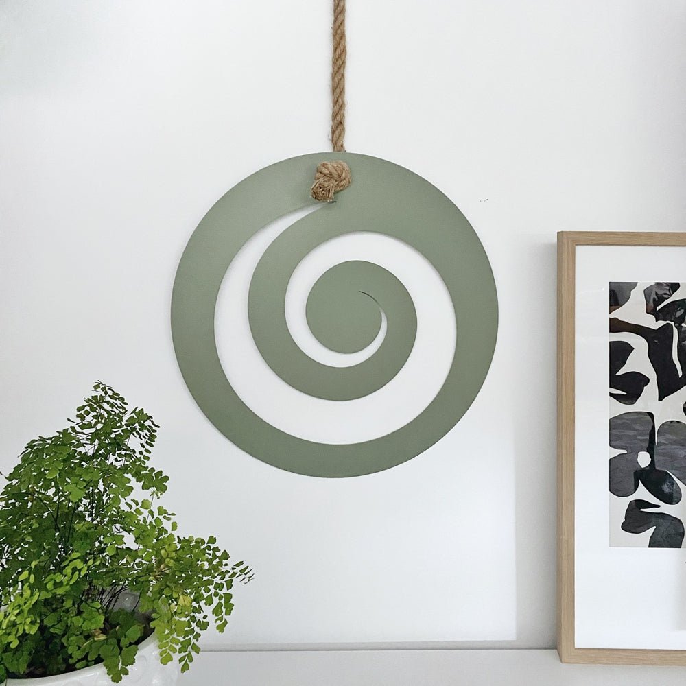NZ made wall art - large koru in trending 2024 colour, green mist. 
