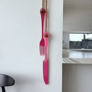 Hot pink kitchen wall art - durable steel cutlery decor made in New Zealand
