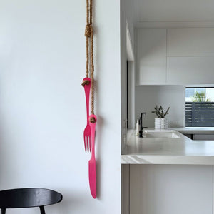 Hot pink steel cutlery wall art NZ - handcrafted kitchen decor for indoor and outdoor use