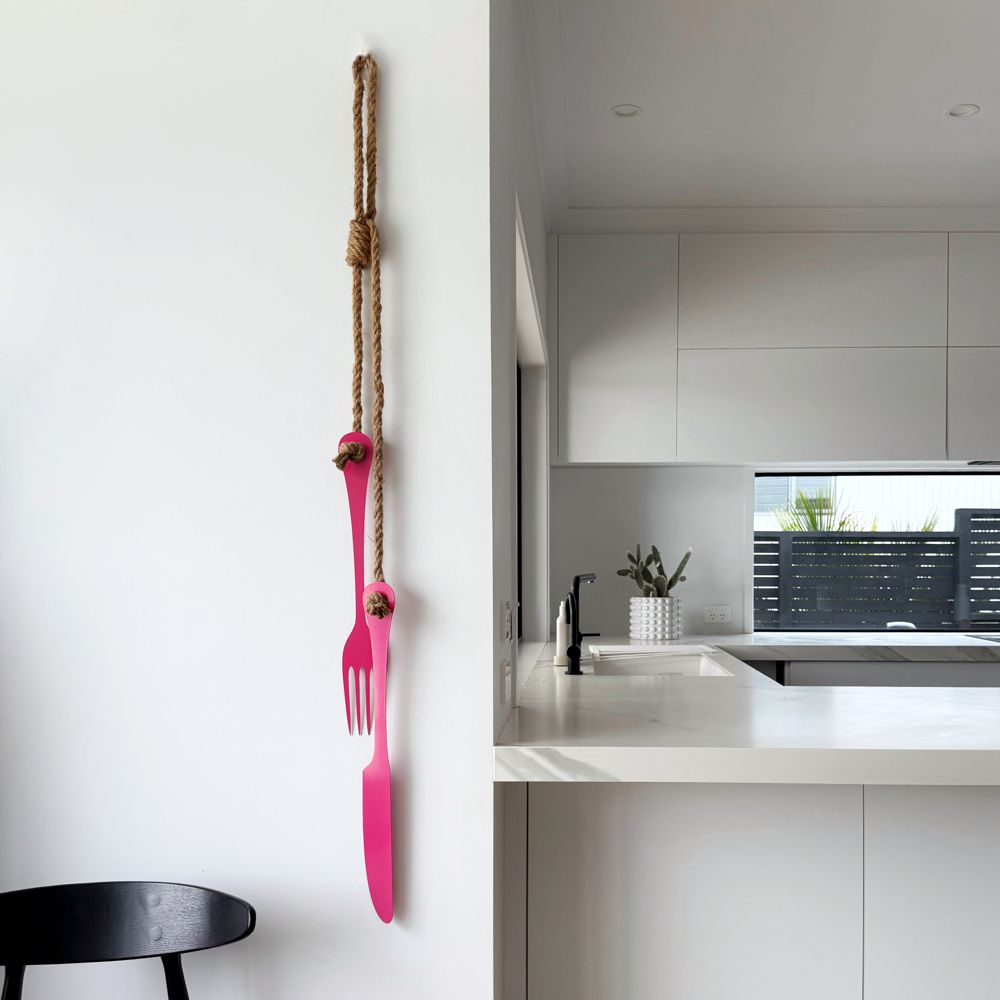 Hot pink steel cutlery wall art NZ - handcrafted kitchen decor for indoor and outdoor use