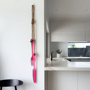 Large hot pink knife and fork wall sculpture - metal wall art NZ for modern kitchens.