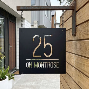Designer address sign on business exterior, custom made hanging sign