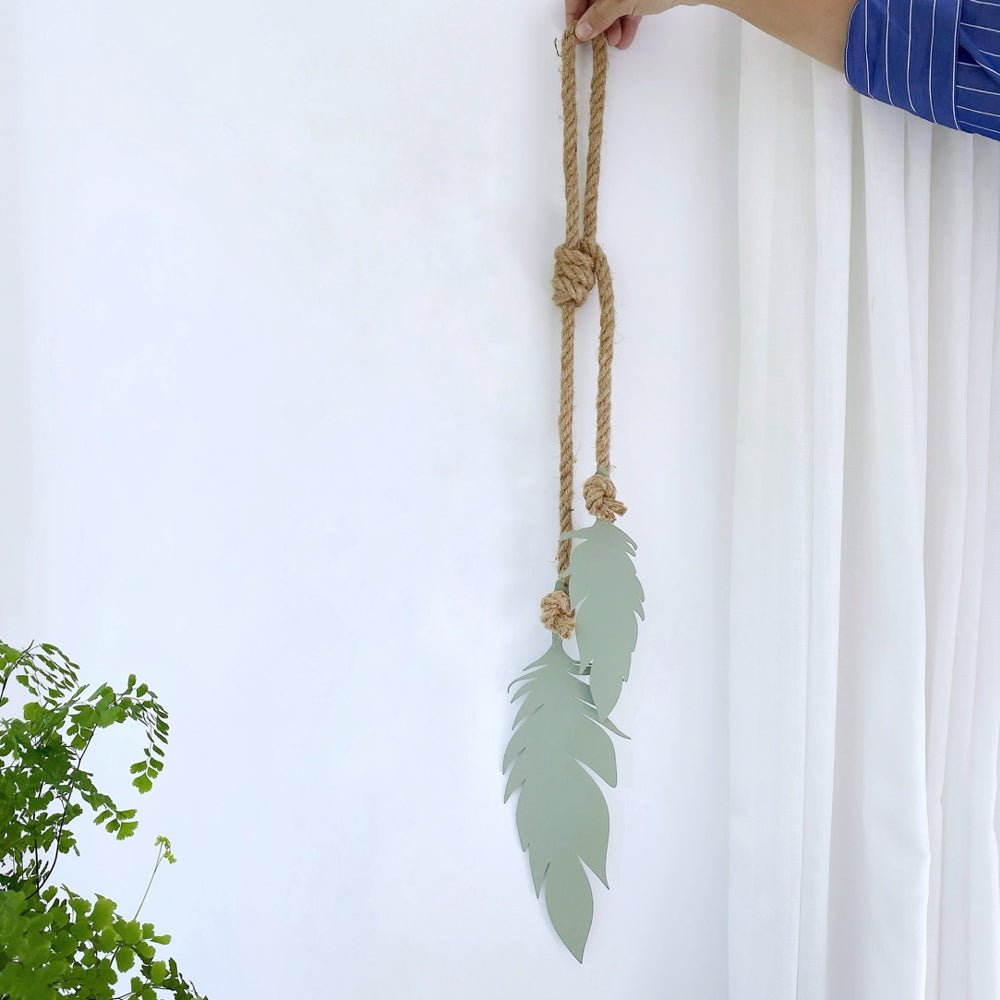 Small feathers in trending 2024 green mist.  Wall decor for home. 
