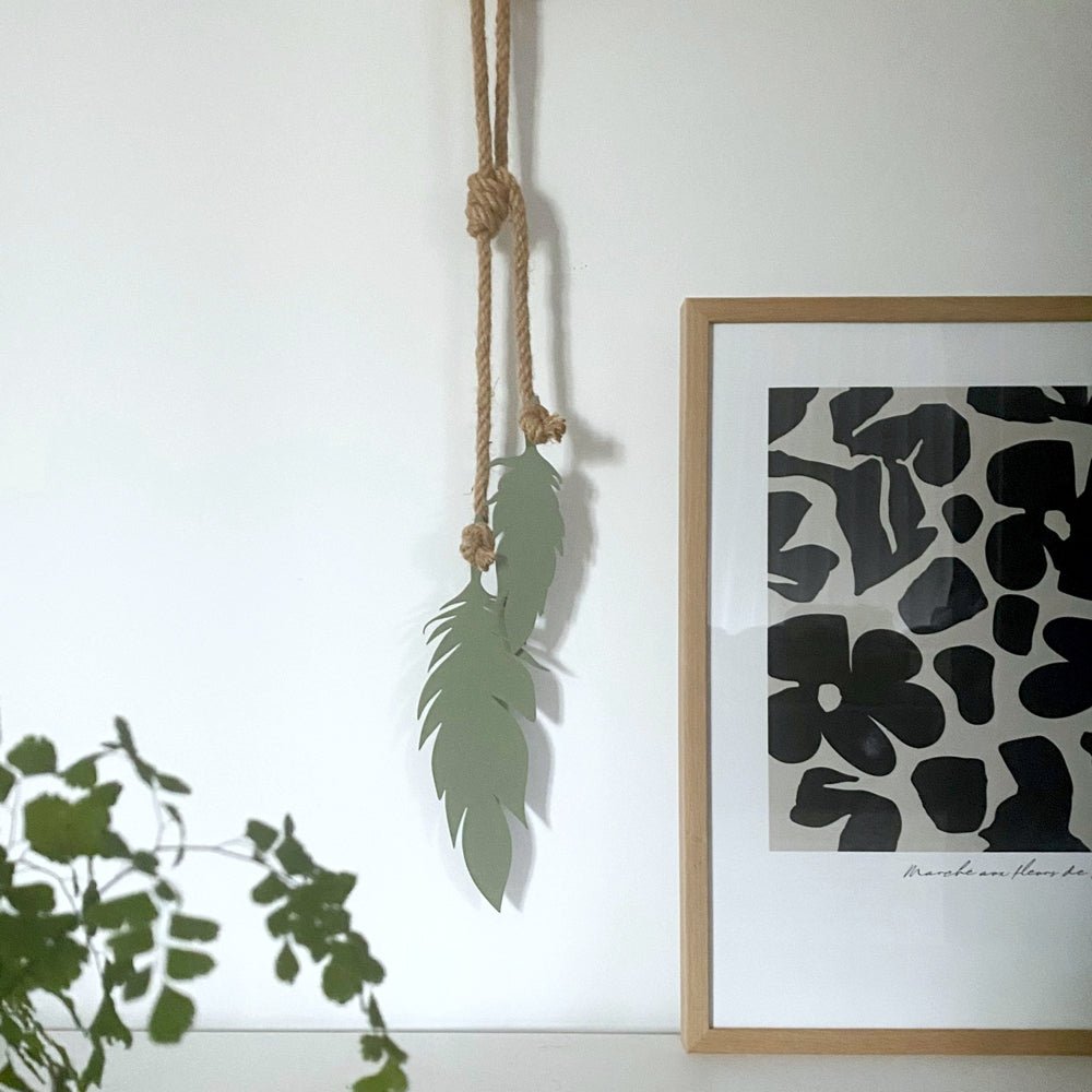 Small feathers in trending 2024 green mist.  Wall decor for home. 