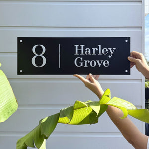 Modern house Number sign on traditional home in New Zealand. 
