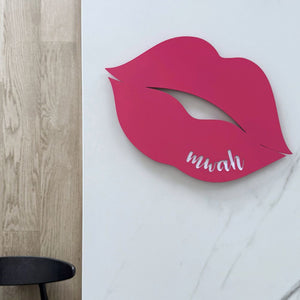 Hot pink steel wall art NZ – “mwah” cut-out design for indoor and outdoor spaces