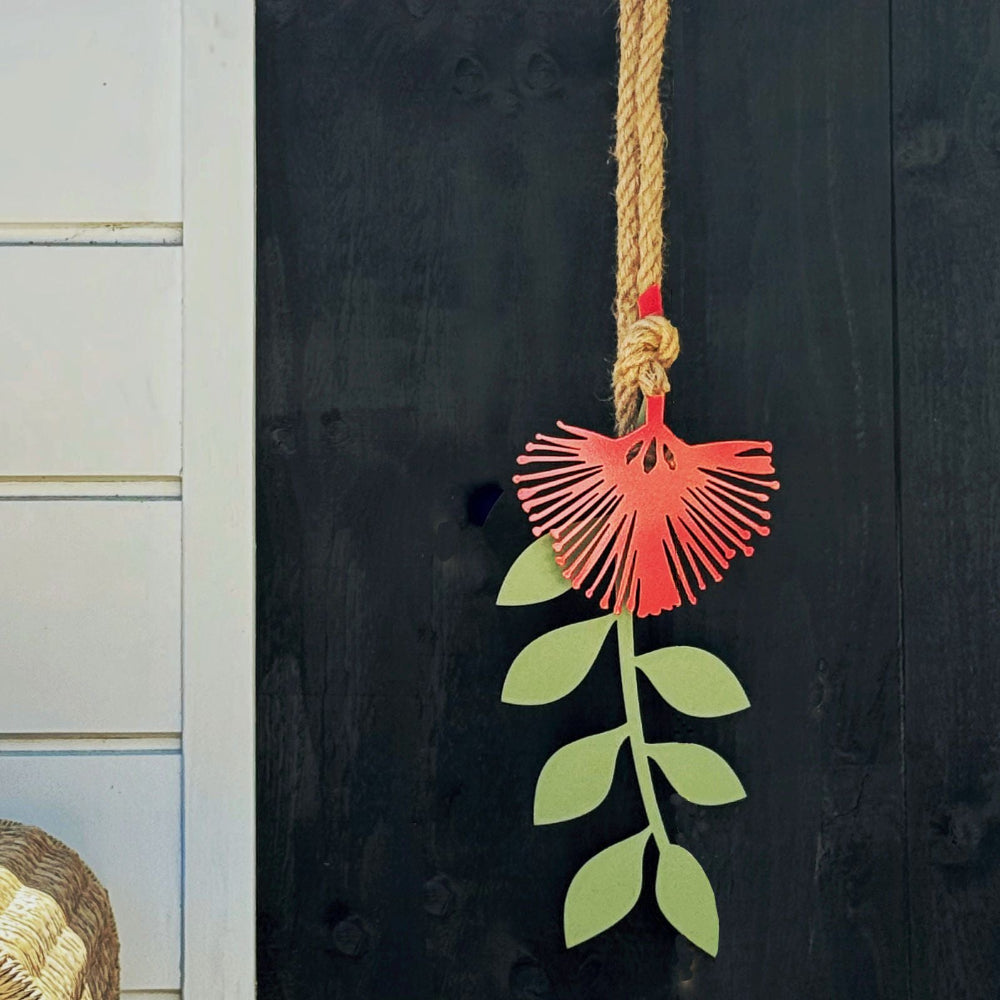 This large pohutukawa metal wall art is laser-cut from steel and made in New Zealand, designed for both indoor and outdoor walls.