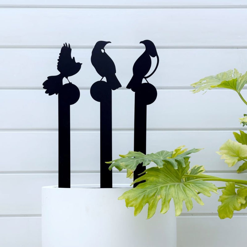 Garden bird stakes in lush NZ garden – handcrafted outdoor art by LisaSarah, linking to garden wall art, ornaments, sculptures and stakes category


